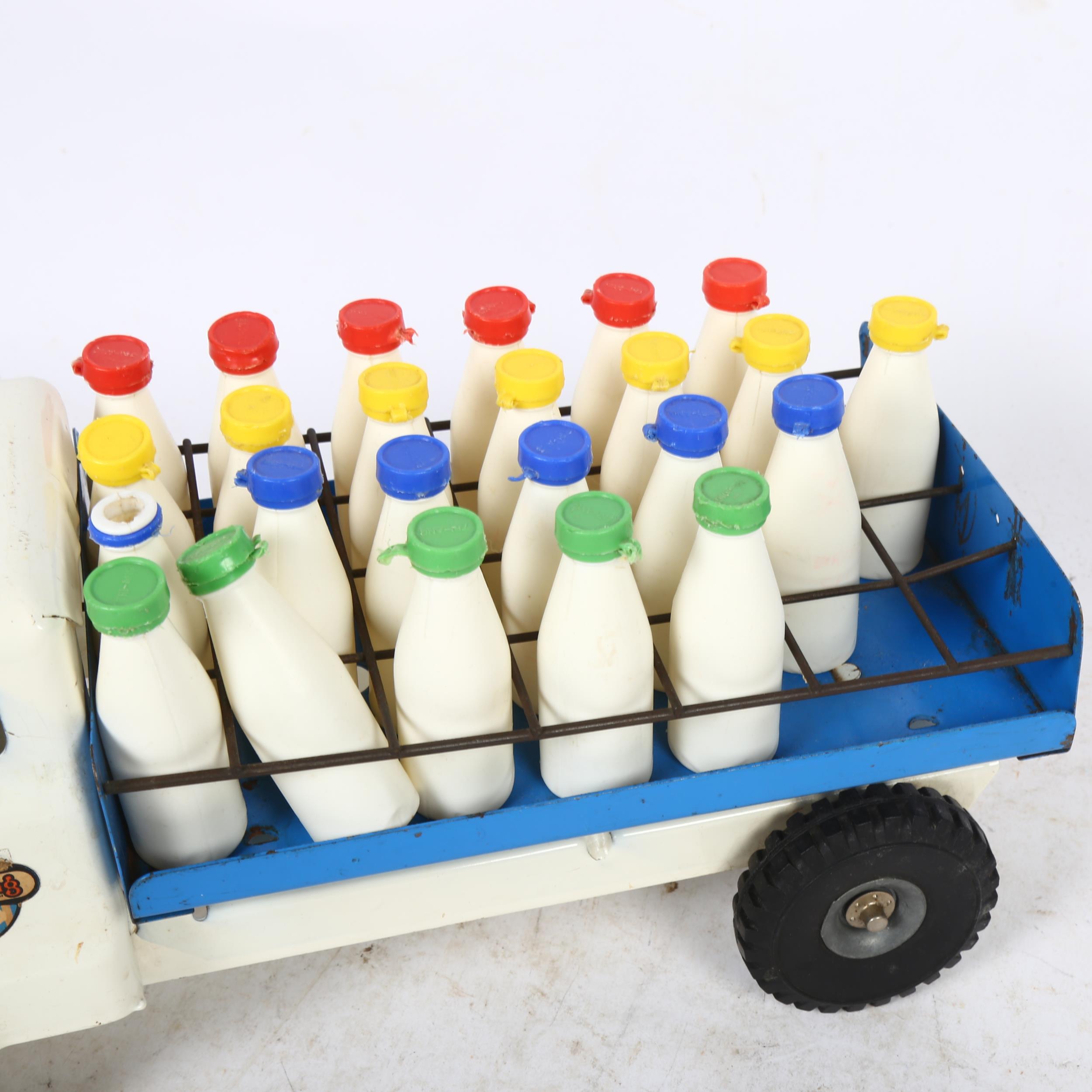 A Vintage Tri-ang milk lorry, with associated milk bottles, 4 of the 28 milk bottles are missing - Image 2 of 2