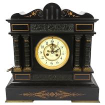 A Victorian architectural black slate and gilded mantel clock, 8-day movement striking in a gong,