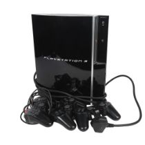 A PlayStation 3 console, with 3 associated controllers, controllers are wireless if necessary In