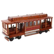 A handmade wooden San Francisco Municipal Railway carriage, L40cm