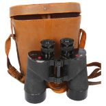 A pair of World War II Rel/Canadia binoculars, marked C.G.B 40MA 7x50, 16571-C dated 1944,