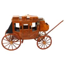 A handmade wooden stagecoach, H28cm