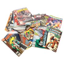 A quantity of Marvel and DC comics, including Spiderman, Batman, Justice League, Wolverine etc