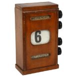 An early 20th century stained wood desk calendar, with day date and month reels, H23cm, overall