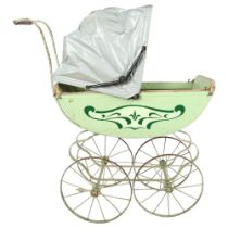 An Antique metal-framed toy pram, height to handle 68cm