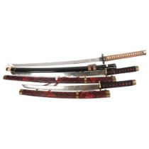 A full-size replica Samurai sword, and a full-size reproduction Wakizashi sword, and a half-size