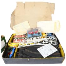 TRI-ANG SCALEXTRIC - a Vintage boxed set, with associated track, cars and other accessories, and a