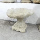 A modern concrete two-section shell design bird bath. 54x44cm.