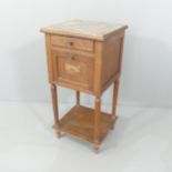 A French oak marble topped pot cupboard, with porcelain lined interior. 39x80x37cm.