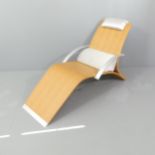 KESTERPORT - A contemporary designer bent ply lounger, with maker's label.