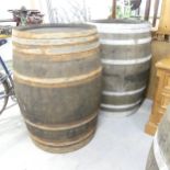 A matched pair of vintage coopered oak barrels. 75x100cm. WITH THE OPTION TO PURCHASE THE