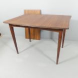 RICHARD HORNBY FOR HEALS - A mid-century Danish style teak draw-leaf extending dining table with one