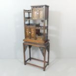 A Japanese Meiji Period two-section Shodana cabinet on stand, with inlaid mother of pearl and carved