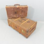 A vintage trunk with label for Burne, named to Gordon R Tysoe, 84x32x53cm, and a leather