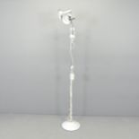 A mid-century style standard lamp, with two adjustable spotlights. Height 160cm.