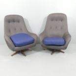 SLÄTTE-GUNGAN - A pair of mid-century swivel lounge chairs, with maker's labels. Recently re-