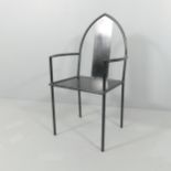 A 1980s post-modern steel armchair by Peter Leonard with Gothic arch.