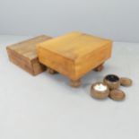 A Japanese Go set comprising two pots of counters and wooden board. 42x28x46cm.