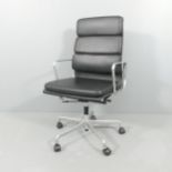 VITRA - a mid-century black leather upholstered EA 219 swivel desk chair by Charles and Ray Eames,