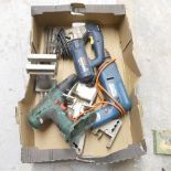 A box containing a Bosch GST97 jigsaw, a Black and Decker D220 hammer drill, a Bosce PSB 24 VE-2 and
