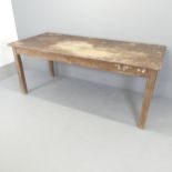 A stained teak farmhouse kitchen table on oak base. 199x82x92cm. Has been used as a garden table, so