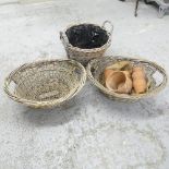 Three wicker baskets, tallest 46x35cm, and 16 terracotta pots.