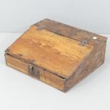 An antique oak bible box with fitted interior. 59x22x50cm Break to left hinge. Evidence of woodworm.