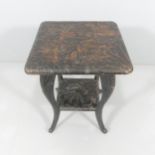 A Japanese Art Nouveau carved wood side or lamp table for Liberty & Co with impressed Japanese