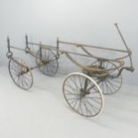 A Victorian iron framed coffin cart / bier. Overall (excluding handle) 200x80x80cm. A/F. Two