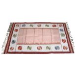 A Swedish Flatweave rug, geometric polychrome design, pink and brown centre, 190 x 122cm Some change