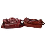 Jacob Fine Leather, a pair of burgundy leather weekend bags, one with original label Purchased by