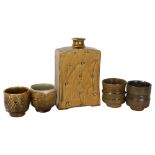 Phil Rogers (1951-2020), a studio pottery ash glaze slab bottle, together with 4 Yunomi / tea-bowls,