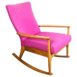 A 1950s/60s Parker Knoll model PK988 rocking chair, upholstered in purple wool fabric, makers