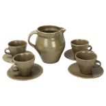 St Ives studio pottery, a set of 4 Leach standard ware coffee cups and saucers and a jug, all with