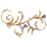 A late 20th century 14ct gold sapphire and diamond floral brooch, set with pear-cut sapphires and