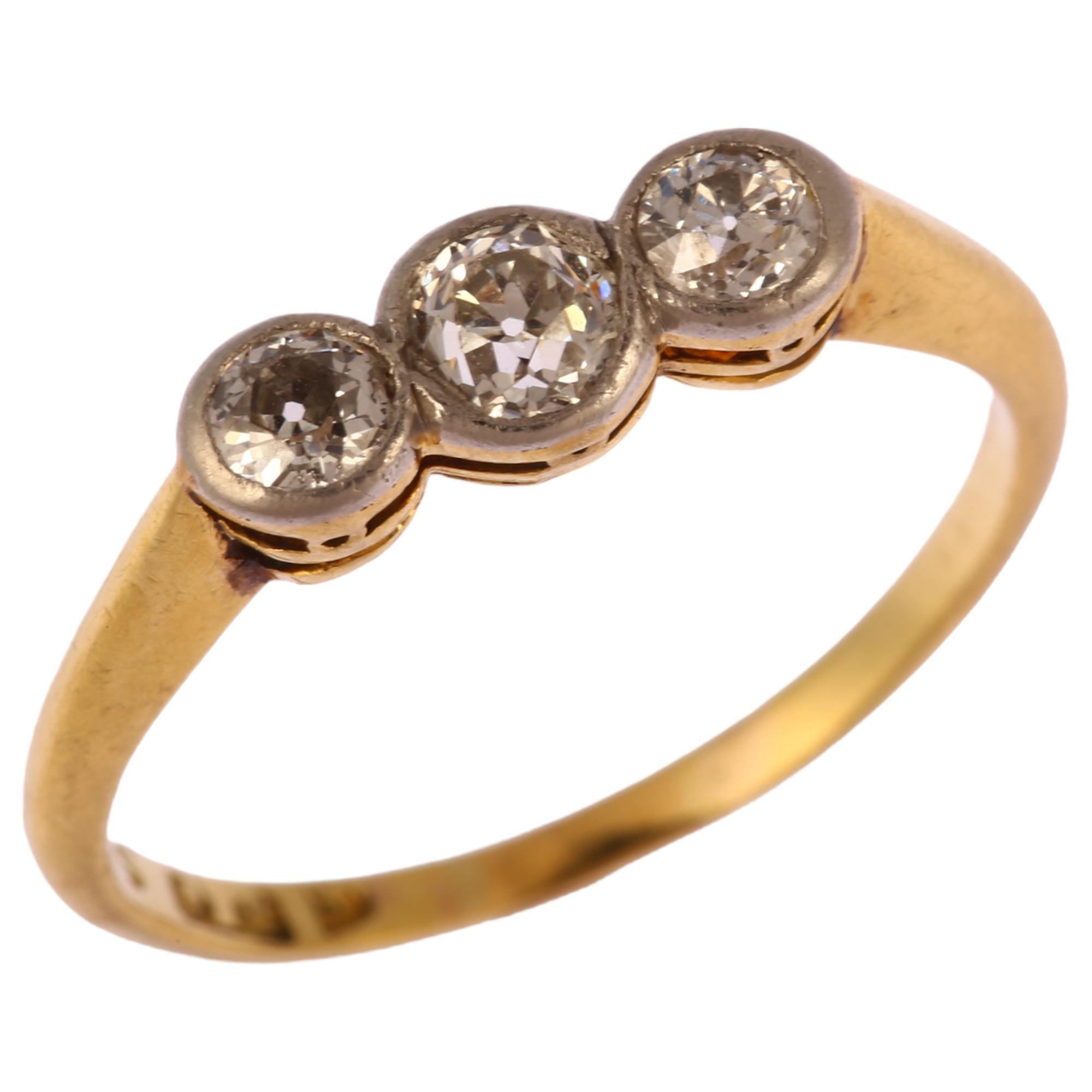 An early 20th century 18ct gold three stone diamond ring, bezel set with old European cut - Image 2 of 4