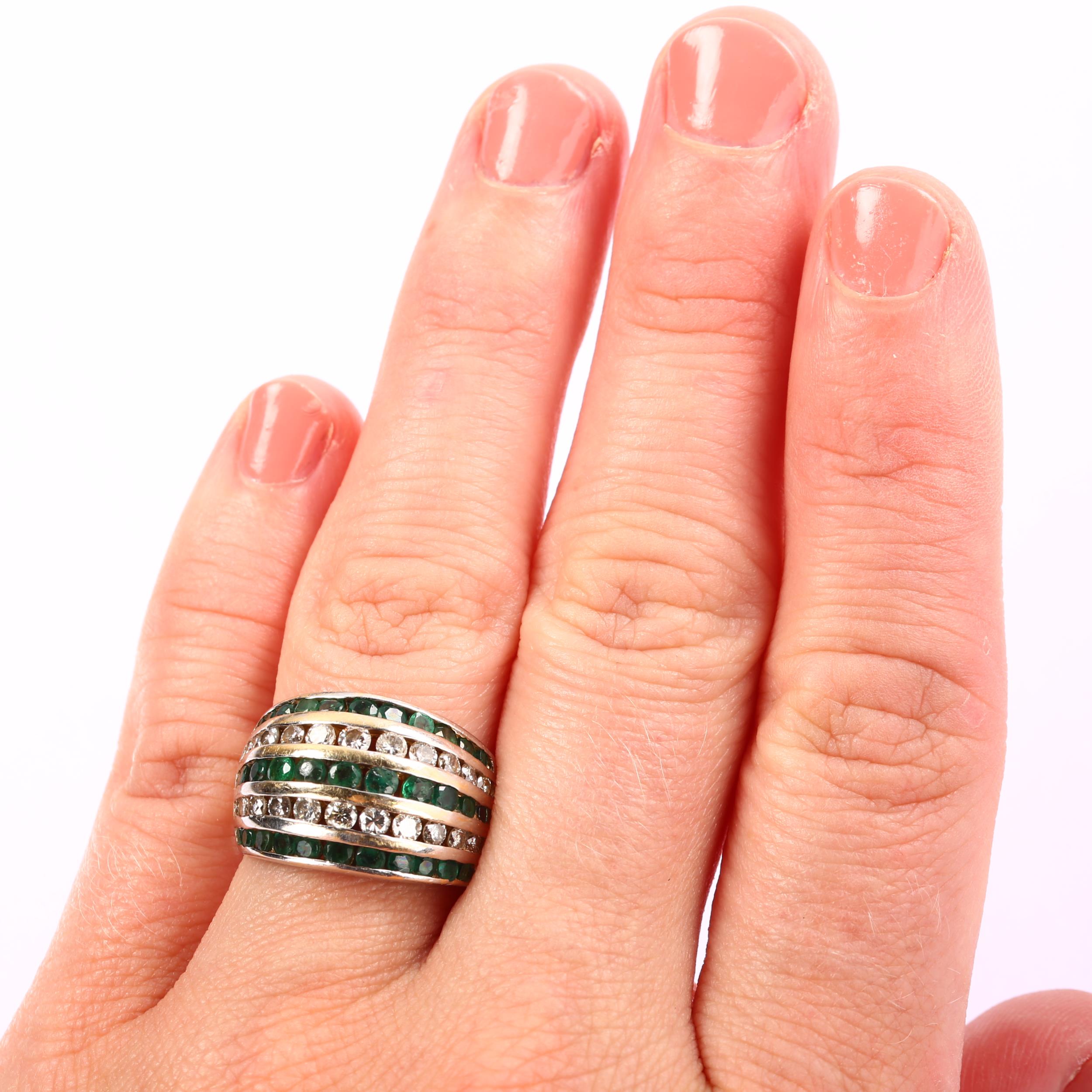 A late 20th century 14ct white gold emerald and diamond bombe ring, maker R&N, channel set with - Image 4 of 4