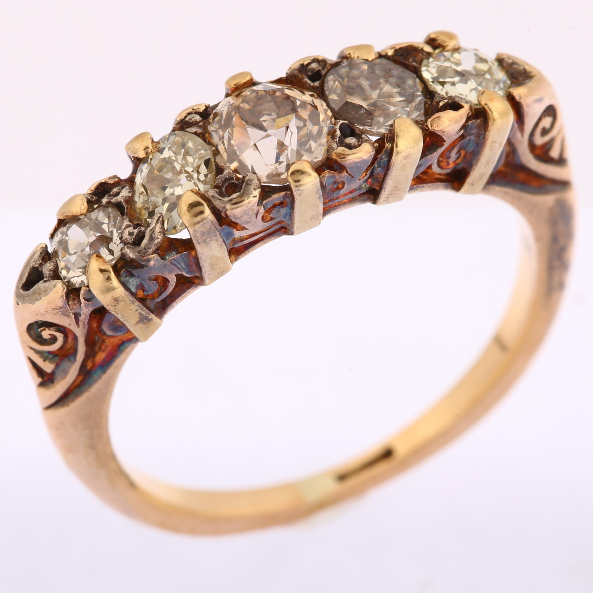 An early 20th century 18ct gold graduated five stone diamond half hoop ring, prong set with old - Image 2 of 4
