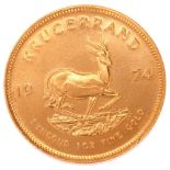 A South African 1974 1oz fine gold Krugerrand coin, 34g No damage, very light wear to high points