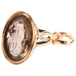 A 19th century smoky quartz 'Die If Divided' seal fob, unmarked 9ct rose gold openwork frame, set