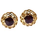 A pair of late 20th century garnet openwork earrings, unmarked gold settings with rose-cut garnet