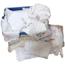A large boxful of embroidered and crochet-edged table linen etc