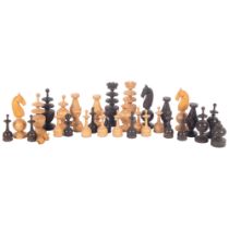 An 18/19th century French Regence pattern chess set, turned boxwood and ebony pieces, king 73mm high