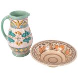 A Crown Ducal Charlotte Rhead bowl with fruit decoration, and a Bursley Ware Charlotte Reid jug,