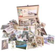 A box containing Antique and Vintage postcards, including greetings cards