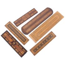 An Acme cribbage board, 33.5cm, 3 inlaid cribbage boards, and 2 Tunbridge Ware type crib boards