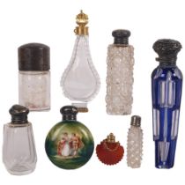 A group of silver and other scent bottles, including a blue overlay scent bottle, a hand painted