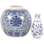 An Oriental porcelain vase with floral decoration, 9.5cm, and a ginger jar