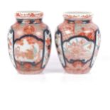 A pair of Japanese Kutani baluster vases, with painted decoration, H15cm Both in good condition