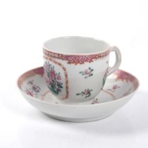 An 18th century hand painted cup and saucer, Lowestoft, floral decoration Cup is in good overall